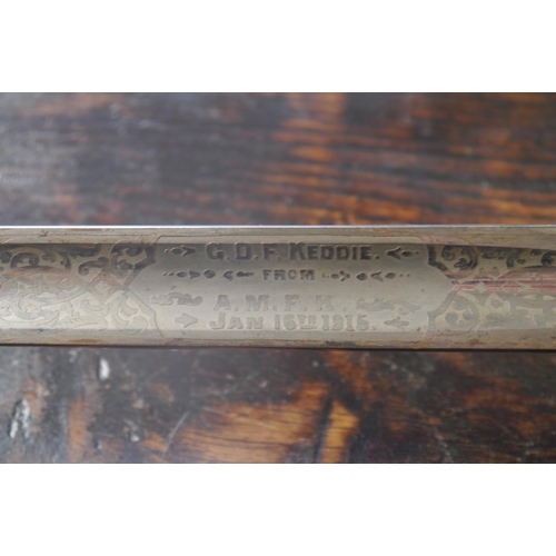 2010 - A 1915 ceremonial sword with presentation inscription to blade