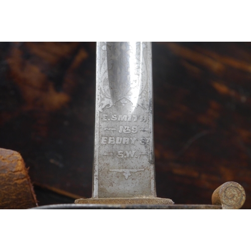 2010 - A 1915 ceremonial sword with presentation inscription to blade