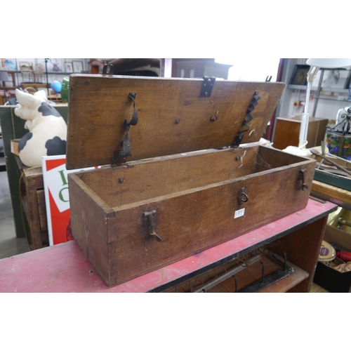 2057 - A metal bound instrument box with butterfly bolts