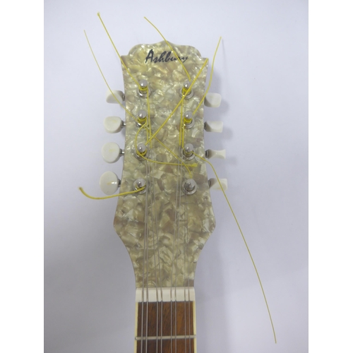 6055 - An Ashbury 8-string resonator mandolin with nickel plated brass body, 71cm length, cased