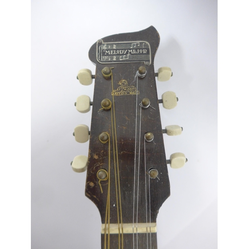 6057 - A vintage GH&S Melody Major mandolin banjo, and a round back mandolin with paper labels 
