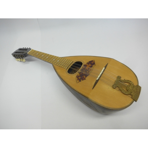 6057 - A vintage GH&S Melody Major mandolin banjo, and a round back mandolin with paper labels 