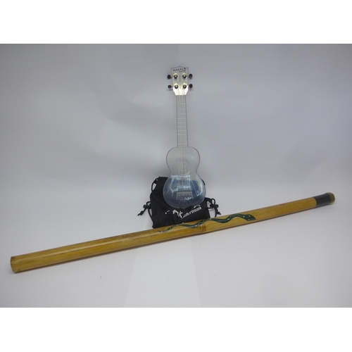 6062 - A Makala Waterman clear perspex ukelele and a didgeridoo (2)