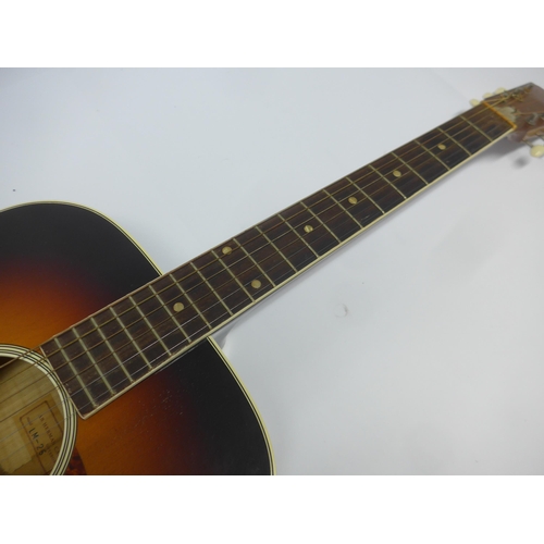 6023 - A 1960s AB Herman Carlson Levin model LM-26 acoustic guitar in sunburst finish, made in Sweden, with... 