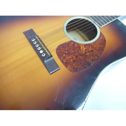 6023 - A 1960s AB Herman Carlson Levin model LM-26 acoustic guitar in sunburst finish, made in Sweden, with... 