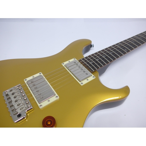 6015 - A Paul Reed Smith PRS SE DGT (David Grissom Trem) gold top electric guitar, maple top with mahogany ... 