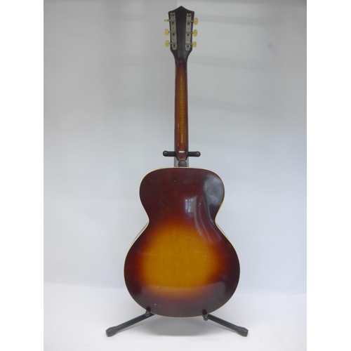 6034 - A 1940s Kay archtop acoustic guitar in sunburst finish with three-line logo decal to headstock, with... 
