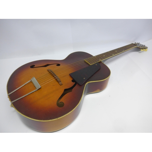 6034 - A 1940s Kay archtop acoustic guitar in sunburst finish with three-line logo decal to headstock, with... 