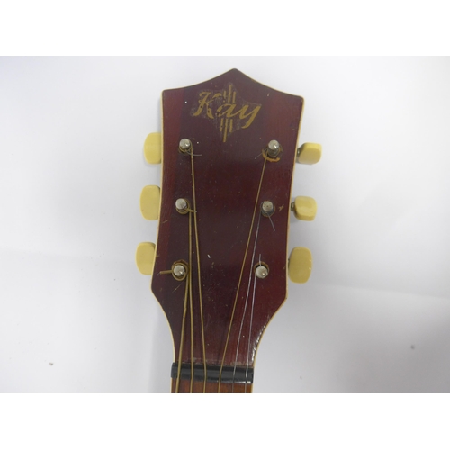 6034 - A 1940s Kay archtop acoustic guitar in sunburst finish with three-line logo decal to headstock, with... 