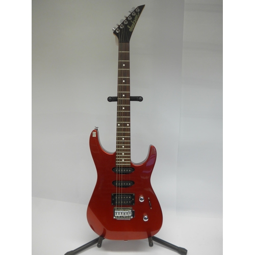 6049 - A Jackson electric guitar in metallic red finish together with a Marshall B25 mk II amplifier (2)