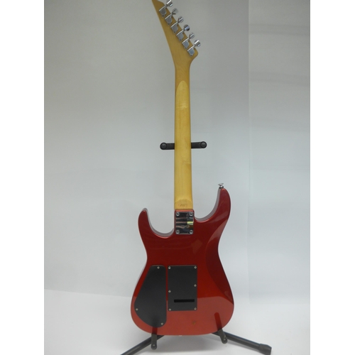 6049 - A Jackson electric guitar in metallic red finish together with a Marshall B25 mk II amplifier (2)