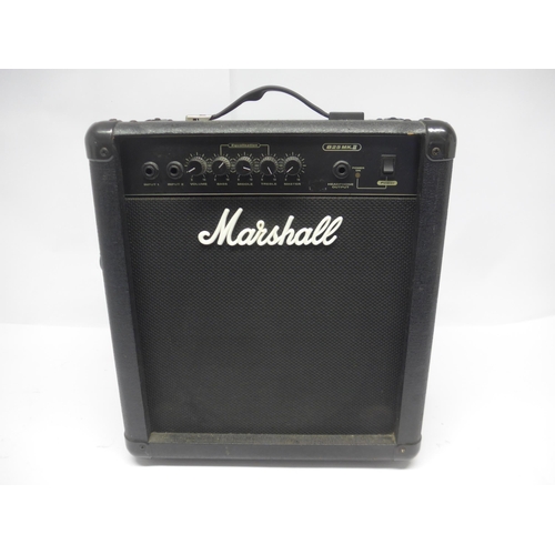 6049 - A Jackson electric guitar in metallic red finish together with a Marshall B25 mk II amplifier (2)