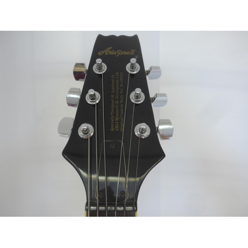 6021 - An Aria Pro II hollow body electric guitar in cherry red finish, c.1988, serial no.8032594, with Kin... 