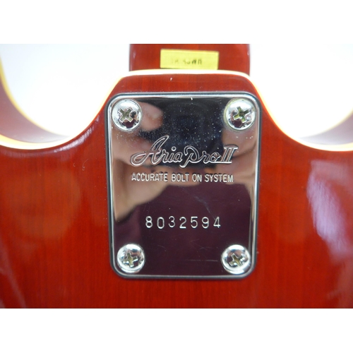 6021 - An Aria Pro II hollow body electric guitar in cherry red finish, c.1988, serial no.8032594, with Kin... 