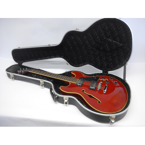 6021 - An Aria Pro II hollow body electric guitar in cherry red finish, c.1988, serial no.8032594, with Kin... 