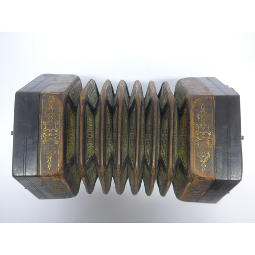 6147 - A Charles Jeffries hexagonal concertina with thirty-nine buttons and six-section leather bellows wit... 