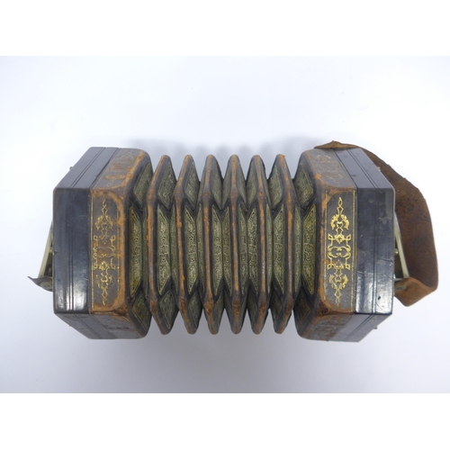 6147 - A Charles Jeffries hexagonal concertina with thirty-nine buttons and six-section leather bellows wit... 