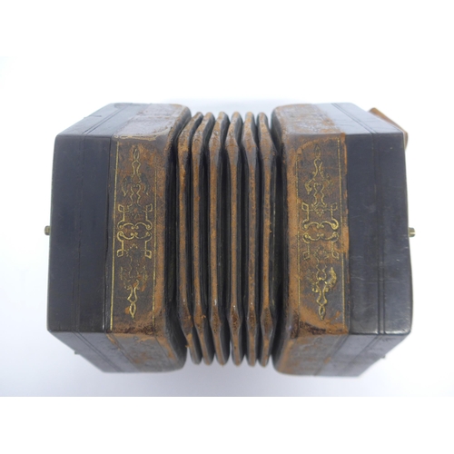 6147 - A Charles Jeffries hexagonal concertina with thirty-nine buttons and six-section leather bellows wit... 