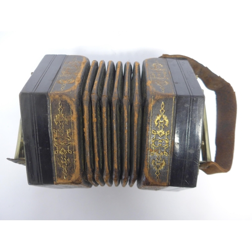 6147 - A Charles Jeffries hexagonal concertina with thirty-nine buttons and six-section leather bellows wit... 