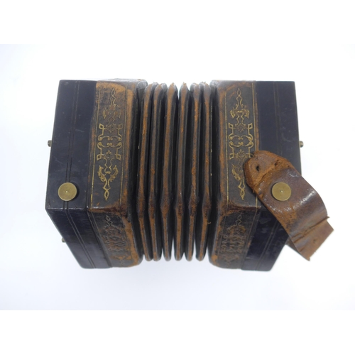 6147 - A Charles Jeffries hexagonal concertina with thirty-nine buttons and six-section leather bellows wit... 
