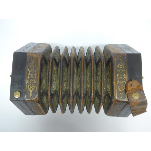 6147 - A Charles Jeffries hexagonal concertina with thirty-nine buttons and six-section leather bellows wit... 