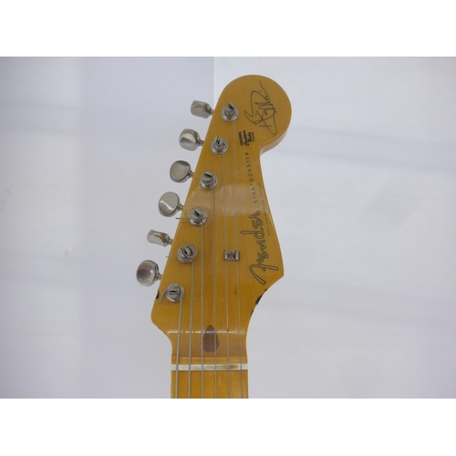 6018 - A 1996 Fender Hank Marvin Stratocaster electric guitar in Fiesta red finish, made in Japan (MIJ), 