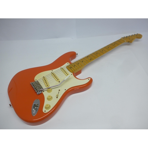 6018 - A 1996 Fender Hank Marvin Stratocaster electric guitar in Fiesta red finish, made in Japan (MIJ), 