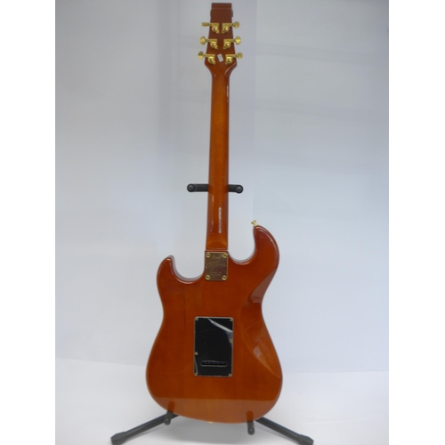 6005 - A Burns Shadow Club Series electric guitar in sunburst finish with pearloid three-section pickguard,... 