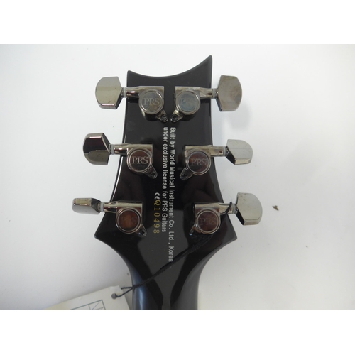 6014 - A 2016 Paul Reed Smith PRS SE Marc Holcomb signature electric guitar, mahogany body with quilted map... 