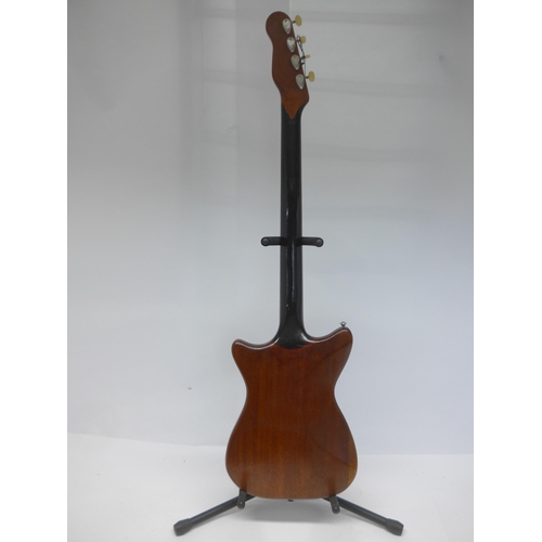 6035 - An early 1960s Burns Sonic electric bass guitar in natural mahogany finish, fitted with two Burns Tr... 