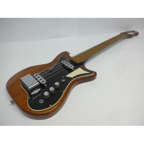 6035 - An early 1960s Burns Sonic electric bass guitar in natural mahogany finish, fitted with two Burns Tr... 