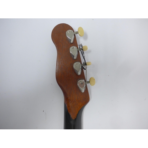 6035 - An early 1960s Burns Sonic electric bass guitar in natural mahogany finish, fitted with two Burns Tr... 