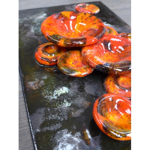 7004 - Three West German Ruscha wall tiles - one with applied 'Mushroom' forms in orange glazes, 37cm x 23c... 