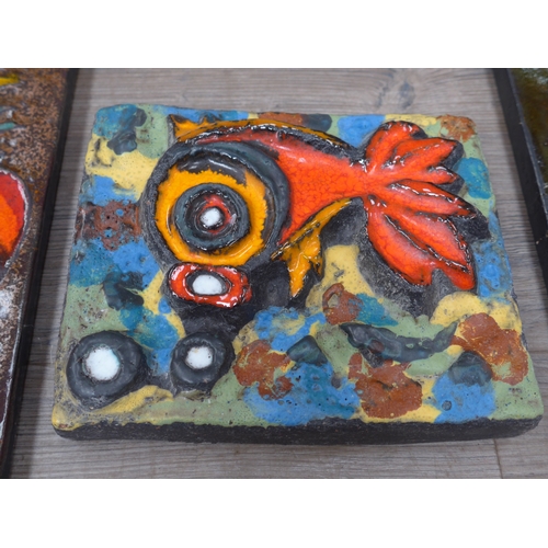 7004 - Three West German Ruscha wall tiles - one with applied 'Mushroom' forms in orange glazes, 37cm x 23c... 