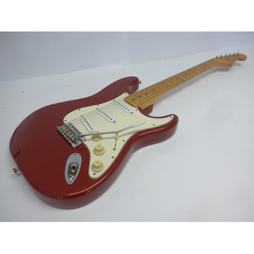 6020 - A Fender Stratocaster electric guitar in metallic red finish, made in Mexico (MIM), serial no. MN626... 
