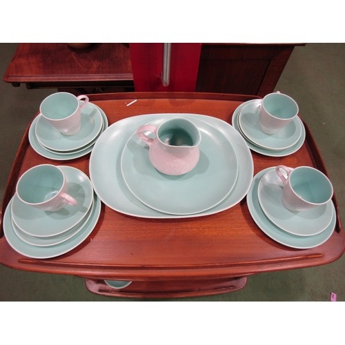 4005 - A collection of Poole Pottery twin tone ceramics, turquoise ground including platter, plates, bowls,... 