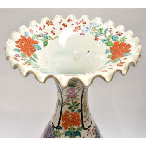 4025 - A large floor standing Japanese vase with pseudo Chinese character marks to base, two vignettes depi... 