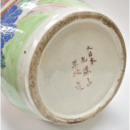 4025 - A large floor standing Japanese vase with pseudo Chinese character marks to base, two vignettes depi... 