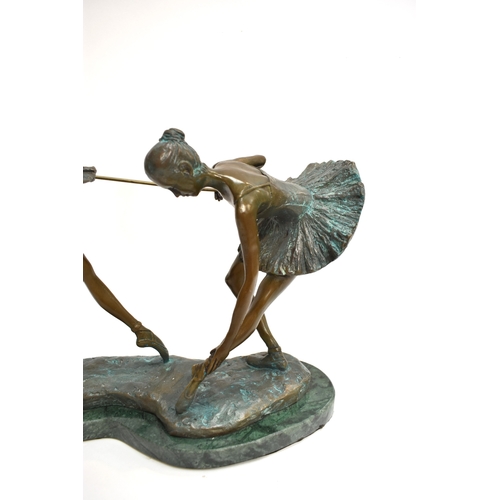 4029 - A pair of contemporary verdigris bronze ballerinas, 32cm tall x 35cm long