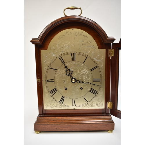 4056 - A 20th Century bracket clock with engraved silvered dial, two train movement.  The dial inscribed Ha... 