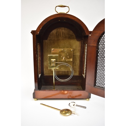 4056 - A 20th Century bracket clock with engraved silvered dial, two train movement.  The dial inscribed Ha... 