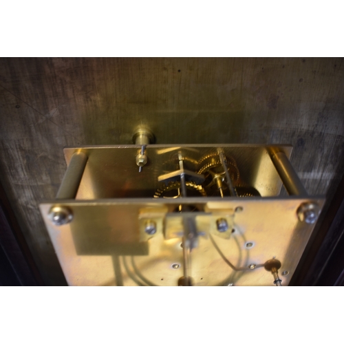 4056 - A 20th Century bracket clock with engraved silvered dial, two train movement.  The dial inscribed Ha... 