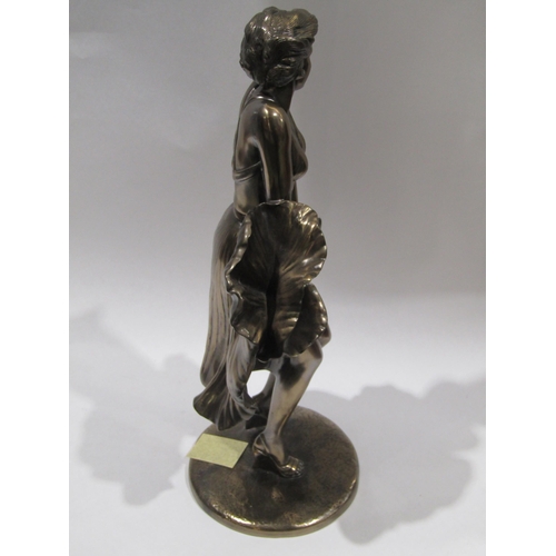 4052 - A bronze effect resin figure of Marilyn Monroe in famous pose, 42cm tall