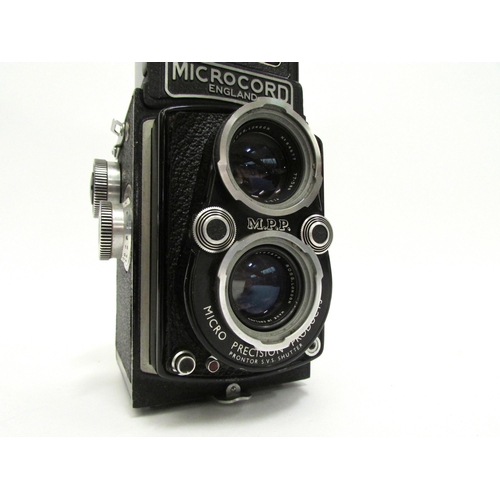 7021 - A 1950's M.P.P. Microcord Mk.II TLR film camera, with a 77.5mm f/3.2 & f/3.5 twin lens and Prontor S... 