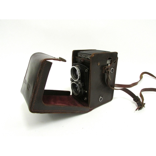 7021 - A 1950's M.P.P. Microcord Mk.II TLR film camera, with a 77.5mm f/3.2 & f/3.5 twin lens and Prontor S... 