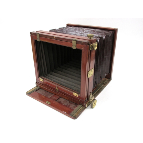 7002 - A late 19th Century mahogany Meagher of London full plate tailboard camera, labelled Meagher Manufac... 