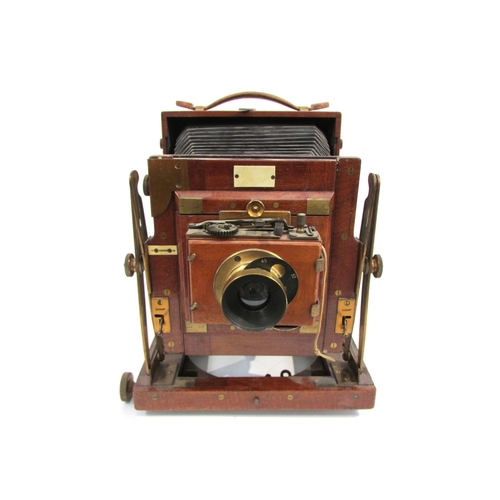 7001 - An early 20th Century Sanderson of London half plate mahogany field camera, serial 12942 circa 1906,... 