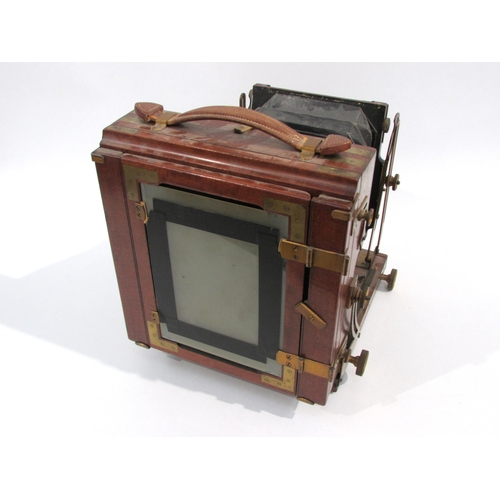 7001 - An early 20th Century Sanderson of London half plate mahogany field camera, serial 12942 circa 1906,... 