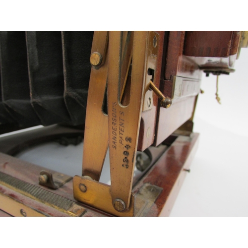 7001 - An early 20th Century Sanderson of London half plate mahogany field camera, serial 12942 circa 1906,... 