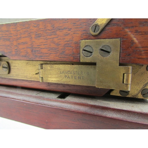 7003 - A Lancaster's Patent mahogany and brass half-plate field camera, black bellows in good order, unname... 